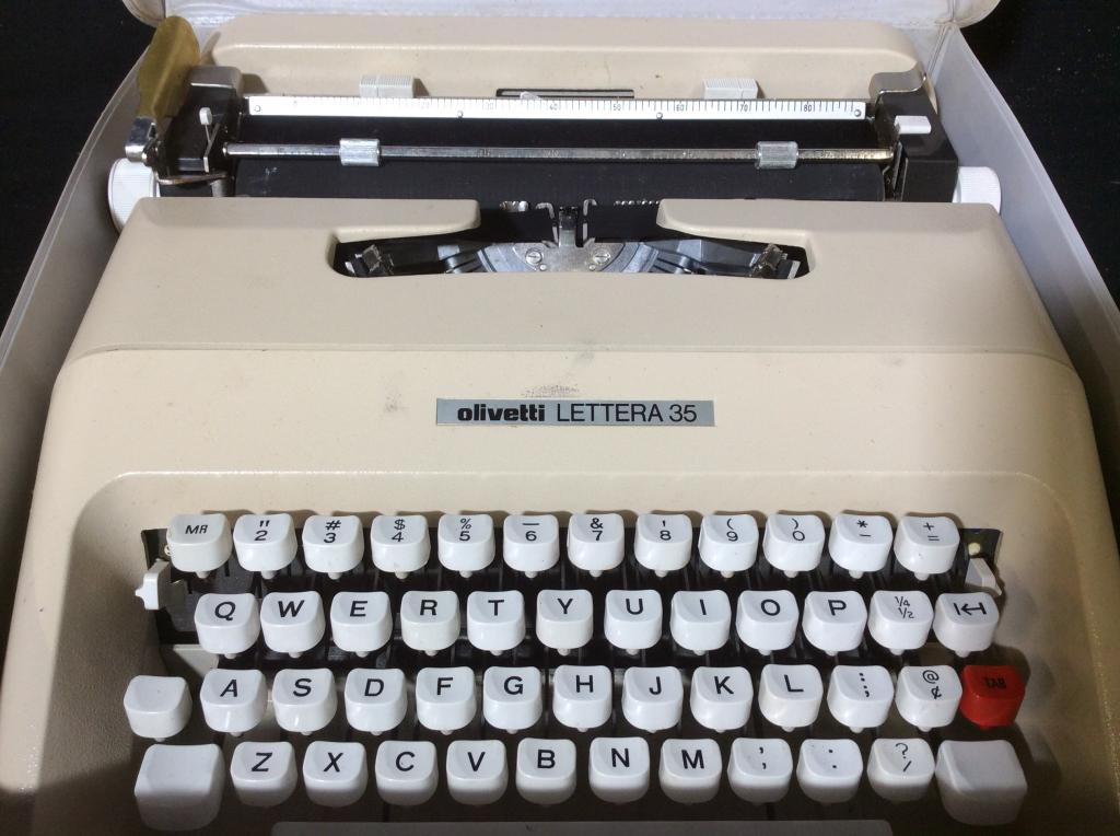 Vintage OLIVETTI LETTERA 35 Portable Typewriter: Portable mechanical typewriter by Olivetti. Measures approx 13 inches wide. Comes in carrying case. Not tested. Typewriter, vintage typewriter, vintage, vintage collectible, collectible item, Collecti