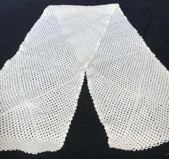Contemporary White Square Tablecloth; Runner Lot 2: Tablecloth, 70 x 70 in. approx , or 5.8 ft. Square. Fabric possibly cotton rayon combo. No major discoloration. Center Medallion design. Fairly thick. Additional cotton macrame Table Runner. Hand knit