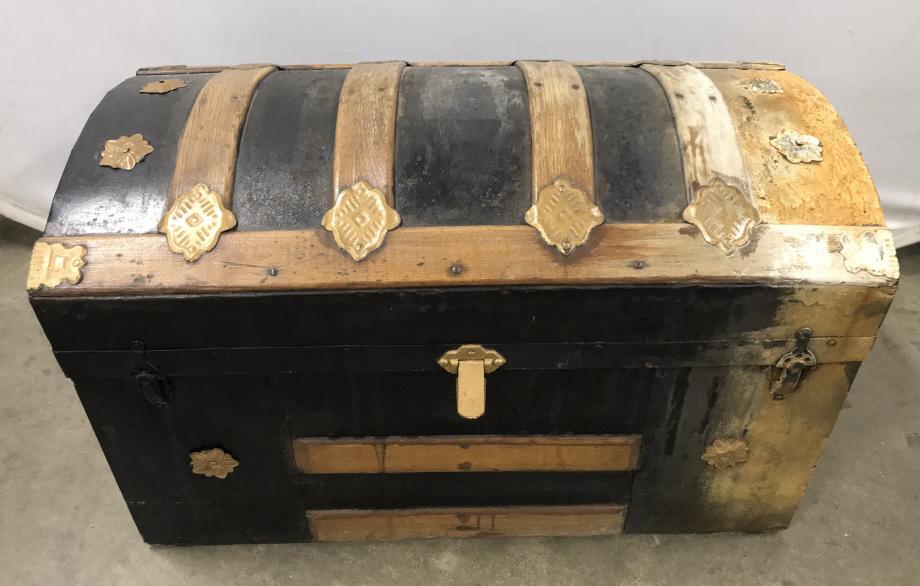 Vintage Steamer Trunk: Vintage Steamer Trunk With black and gold toned painted finish, some rusting and damage to one side, one handle missing, measures approximately 28 inches long x 15 inches wide x 17 inches tall. Vintag