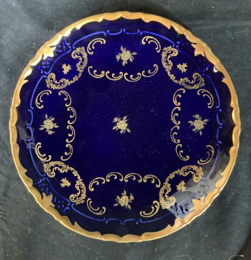 Cobalt Blue Porcelain Gold Accents: Porcelain plate, collectible, tableware, cobalt blue with gold trim gold design, diameter app 8 inches, marked underside trade marked R, bone China, illegible additional markings
