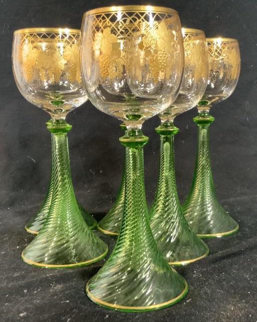 Set 6 Venetian Art Glass Wine Glasses: Each glass hand formed with green and clear swirl base with gold rim accents, crystal cups have painted gold bunches of grapes with trim and rim accents, glasses measures ht 7.5 inches, good condition