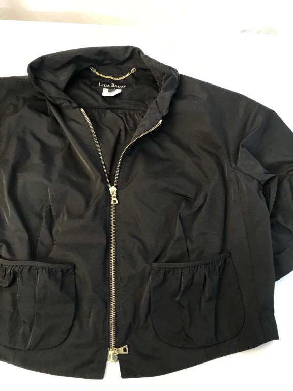 LIDA BADAY cropped black jacket: LIDA BADAY cropped black jacket. Made out of 100% polyester. Size 10. Dry clean only, short wash cycle. Front features a double zipper. Short sleeved jacket with slight balloon sleeves. Two front pock