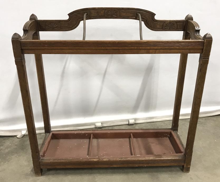 Antique Arts And Crafts Style Umbrella Stand: Antique Arts And Crafts Style Umbrella Stand, some nicks and discoloration to wood, marks to metal pan, measures approximately 28 inches long x 10 inches deep x 28.5 inches tall. Hallway Umbrella Stan