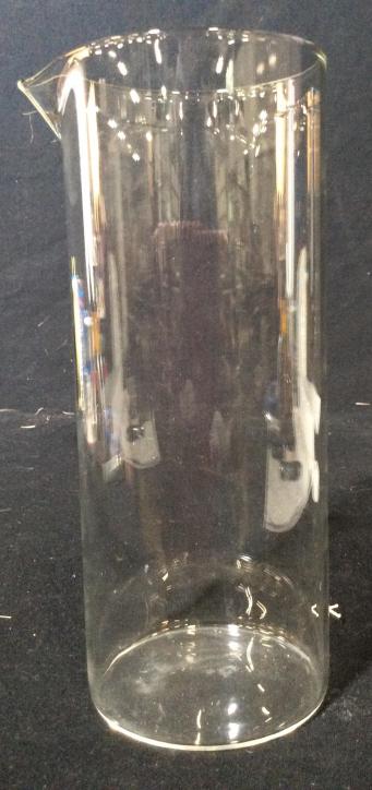 Tall glass beaker: Tall glass beaker measuring approximately 7 inches tall and 3 inches diameter. Beaker, Glass beaker, Glass, measuring, water pitcher, pitcher, glass pitcher, glass, collectible, collectible glass, col