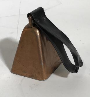 Vintage Copper Cow Bell: Label has black handle with strong deep ring. Bottom of bell measures approx 4 in. Bell height is approx 3.5 in. Entire piece with handle measures 7 1/4 in tall. Farmer Collectible, Vintage Copper Bel