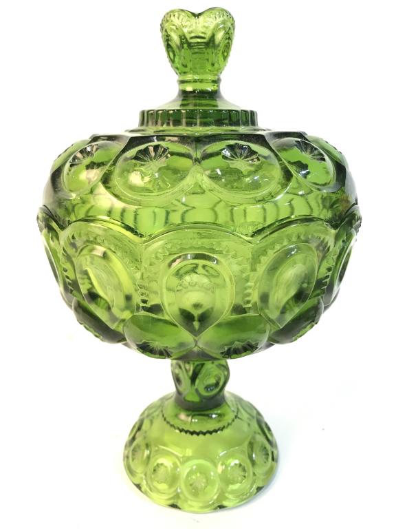 Green Toned Pedestaled Art Glass Candy Dish: Piece is green toned and Pedestaled. Piece includes lid. Contains intricate geometric bevel & Relief Detail. Measures approx 9.5 inches tall 6 inches wide. tableware, decorative accessories, centerpie