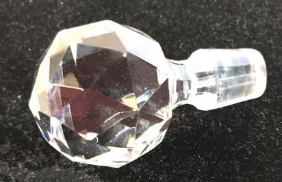 Cut Glass ‘ Crystal Ball’ Bottle Stopper: Measures 3 in. Long. Ball circumference 5 in. Stopper Part - diameter. 5 bottom, 2 1/4 in. circumference. No scrapes, marks. 1 nick. Barware, Bottle Stopper, Cut Glass, Artisanal Glass, Cut Ball Shape