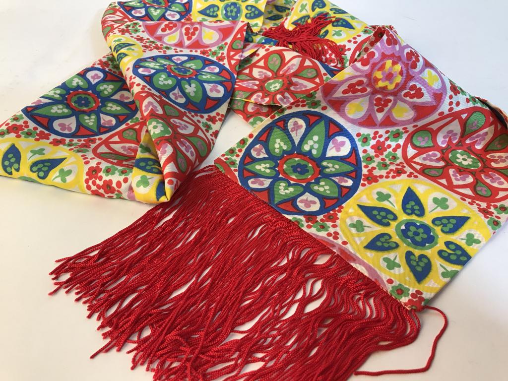 Vintage Double Panel Fringe Edge Scarf, Fabric: Bright colors, thicker satin like material (possibly a satiny polyester). Red string tassels at long ends. Material measures approx 6.5 x 61 in. c. 1960s No fabric issues. Tapestry, Vintage Mandela Pa