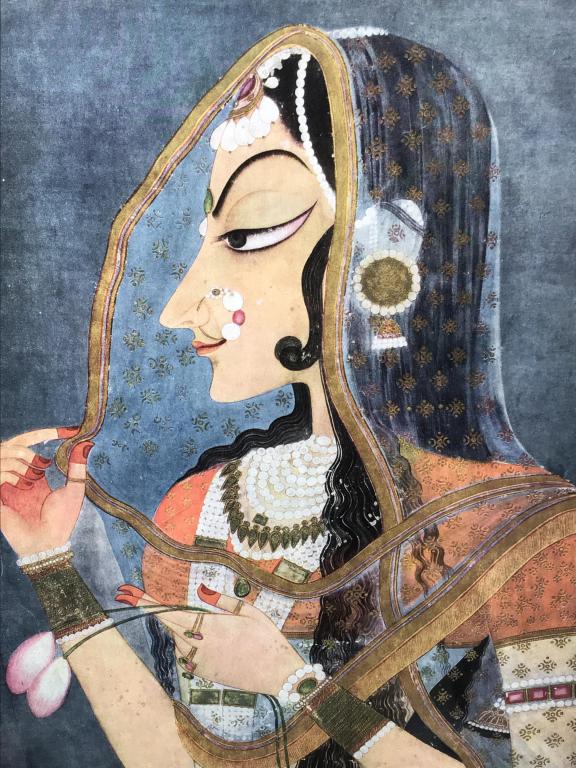 Framed Indian Miniature Bani Thani Print: Framed print of woman’s portrait, Bani Thani, by Nihâl Chand from the Marwar school of Kishangarh. Print is set behind glass in textile lined wood frame. Measures approx 21.5 inches in height by 17