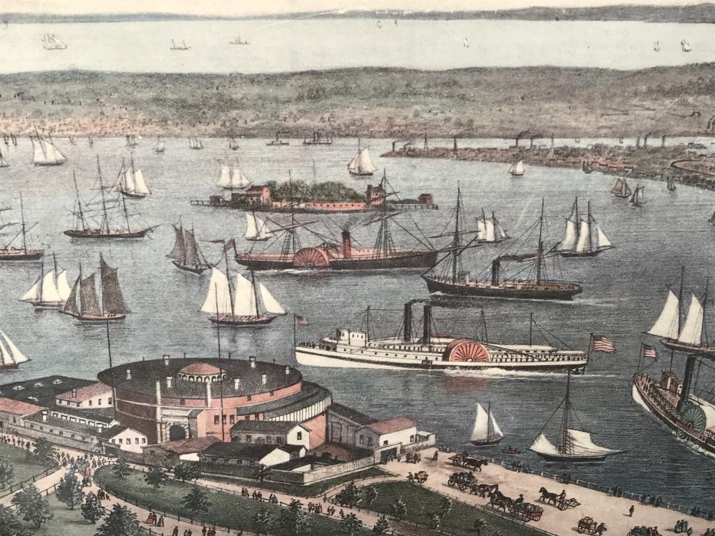 Framed Currier & Ives Bay Of New York Bay Print: Reproduction of a Currier & Ives lithograph, type along bottom reads ‘Upper And Lower Bay Of New York, from the Battery looking South-west.’ Print is matted and set behind glass in wood style fram