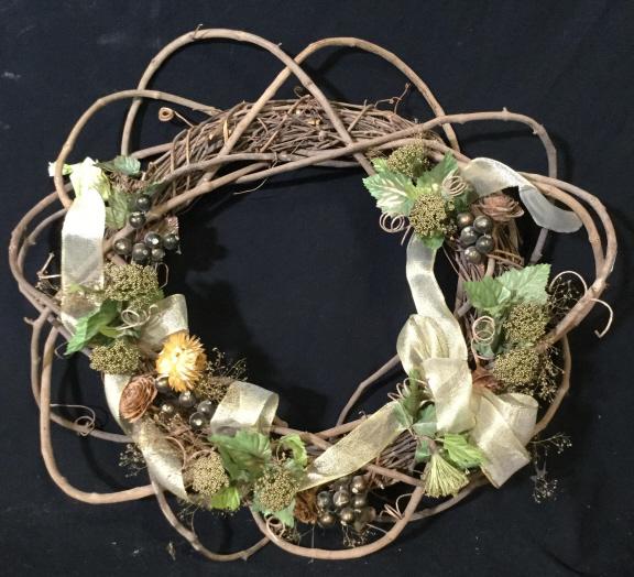 Rustic Foliage Hanging Wreath: Foliage hanging wreath measuring approximately 20 inches in diameter. Golden ribbon accent. Features rustic foliage, twigs, vines, and golden ribbon. Rustic, home, home decor, decor, fall, foliage, wa