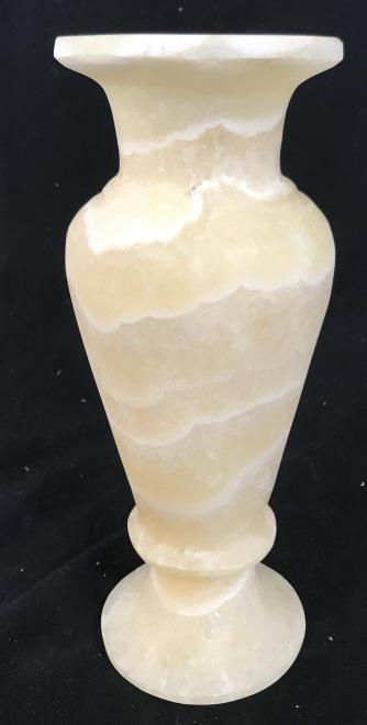 Carved Egyptian Alabaster Stone Vase, Vessel: Pedastal Vessel, Vase made out of natural alabaster, cream yellow in color with distinct stone markings. Approx 10 in. Tall, 3 1/4 in. diameter base. Opening hole measures approx 1.5 in. Largest circu