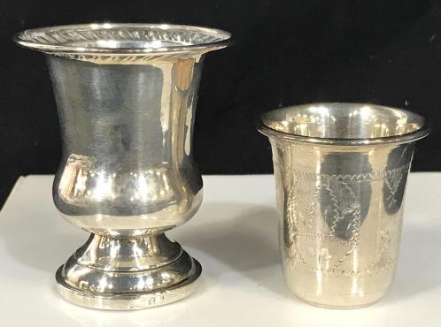 Weighted Sterling Judaica Hollowware Vessel: Pair 2 Nesting Cups. Inner cup is etched, ‘Sterling’ is hallmarked on underside. Larger cup has a short pedestal with base. Underside marked ‘Sterling Weighted 6’. Measures 3 in. Tall. 2.5 in.