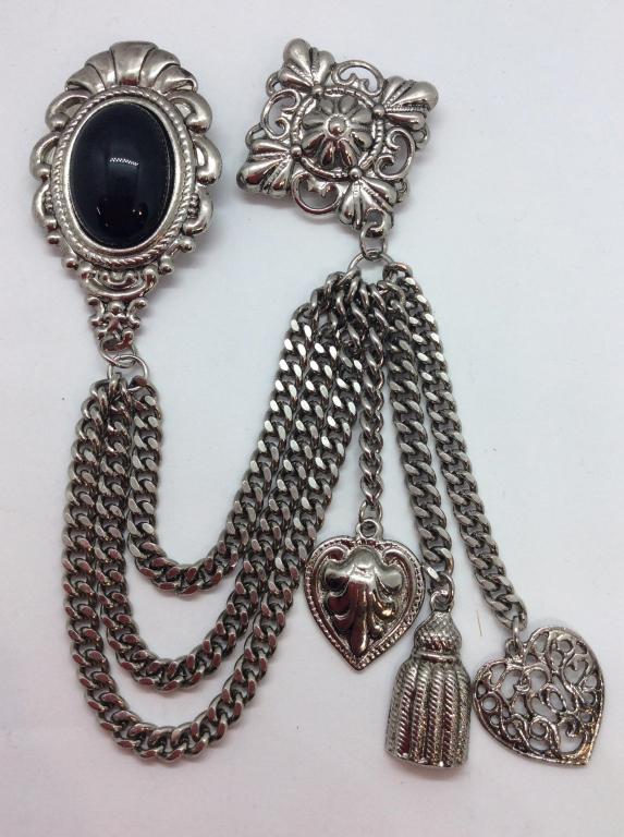 Collar clip with hanging Chain and Pendants: Silver toned metal, black toned cabochon, appears to be composite material, filigree and tassel design pendants, three graduated hanging chains, sweater clips, collar chains, hangs approx 5 in. Fashio