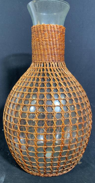 Pier 1 Basket Weave Over Glass Vase: Table ware, basket weave, lattice work over glass vessel, measures ht App 19 inches diameter app 12 inches, made in Vietnam