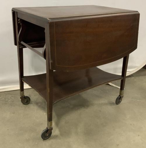 Vintage Mahogany Drop Leaf Tea Cart: With banding trim, on casters, drop leaf sides lower shelf, tea cart, trolley, bar Cart, side table , end table , tea table, has some surface wear, sides down table measures ht 29 inches, top 18 by 27