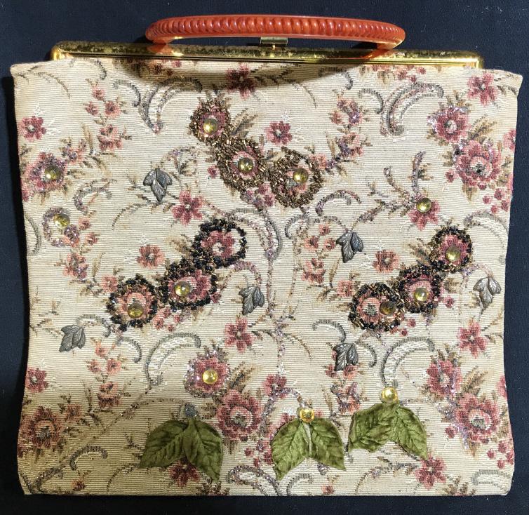 Vintage Tapestry Handbag w BAKELITE Handle: Hard case fabric purse with orange bakelite handle. Hangs 4 in. Bag has added crafts to material- beads, rhinestones, felt leaves and glitter, Hand Crafted. Measures 13.5 in wide, 12 in. tall. Snap li