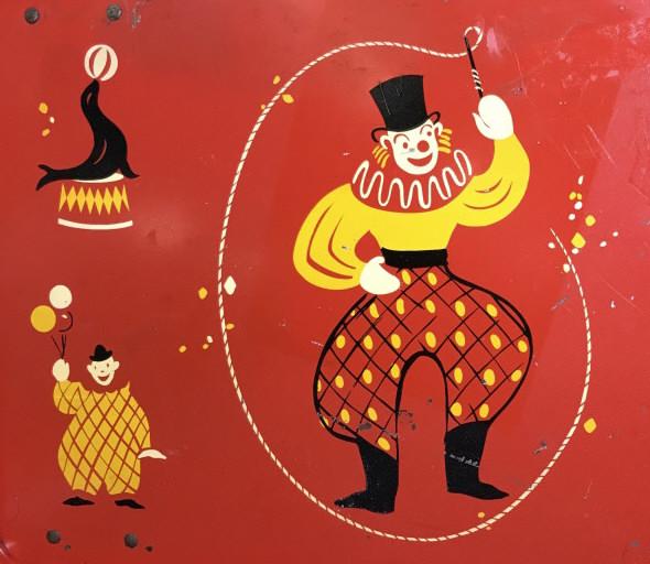 Vintage Clown Motif Litho Tray, c. 1950: Circus Theme Litho on Metal Tray. Tray has folding legs to sit over person in a reclined position. Mild paint wear on edges. Measures 20 1/4 x 13 1/4 in. Standing height measures approx 8 in. Vintage 