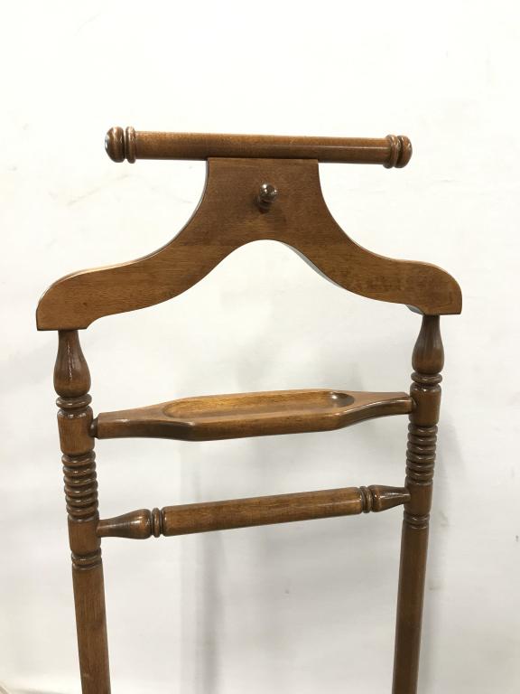 Cherry Toned Wooden Valet Butler Stand: Cherry Toned Wooden Valet Butler Stand With Turned Wooden Design. The plantation cherry valet stand provides a place for all your items, including a convenient soft shoulder shaped hanger for jackets