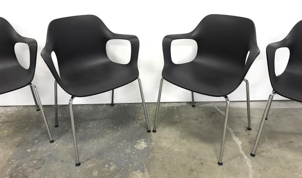 Set 4 VITRA Industrial Modern HAL Stackable Chairs: Set 4 VITRA Industrial Modern HAL Arm Chairs with black toned shell and tubular steel legs. Marked on underside of shell with VITRA Hal embossed into surface and addition VITRA Labels, minor scuffs to