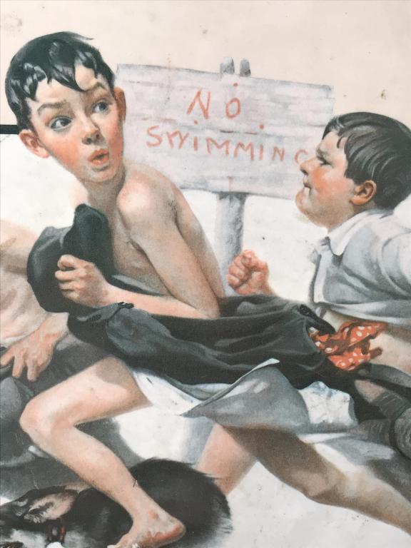Vintage Framed Norman Rockwell Print, No Swimming: Vintage Norman Fockwell print depicting boys and a dog running with a sign behind them that reads ‘No Swimming.’ Vintage print, possibly laminated offset lithograph on board. Print is set in scrub
