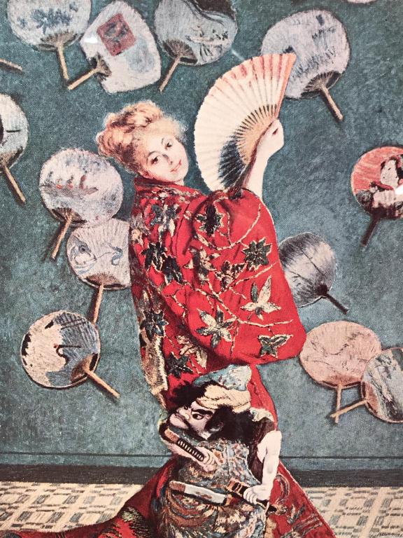 Framed Monet Print, Madame Monet in Japanese Dress: Framed Monet print of ‘Madame Monet in Japanese Costume’ originally Painted in 1876. Print is mounted, matted, and set behind glass in silver tone metal frame. Verso has description of original ar