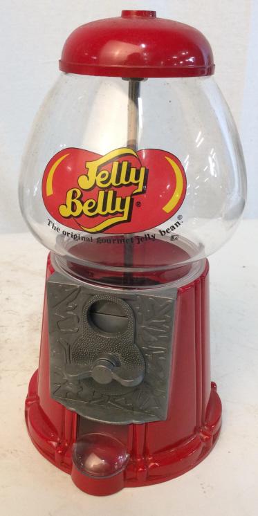 Jelly Belly Coin Operated Dispenser: Coin operated metal and Glass jelly bean dispenser. Measures approximately 12 inches tall. Unscrew top to fill. Jelly belly, jelly beans, jelly bean, dispenser, gum ball machine, carnival, arcade, gam
