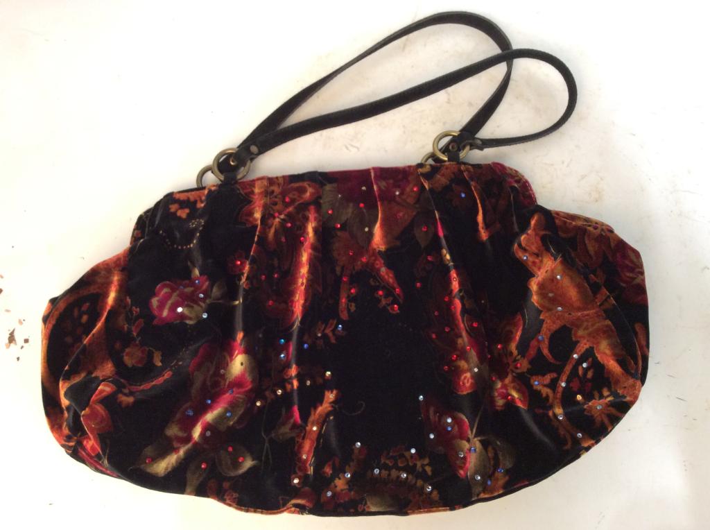 Vintage Serpui Marie Velvet Floral Purse: Vintage Serpui Marie velvet purse with floral design. Button closure. Possibly leather straps. Decorative red white and blue gems on outside of bag. Approximately 17 inches wide and 9 inches tall. Som
