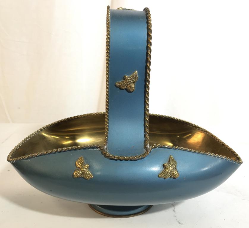 Cornflower Blue & Gold Toned Metal Basket: Piece is light blue & gold toned. Structure is metal. Contains beveled bee detail. Measures approx 10 inches tall 11 inches long, 7.5 inches deep. basket, table top accessory, home accent, tableware 6