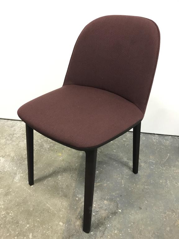 VITRA Softshell Side Chair: The Vitra Softshell Side Chair By Ronan & Erwan Bouroullec , whose gentle contours are defined by its soft dark cranberry toned upholstery, provides exceptionally comfortable seating and compact dimen