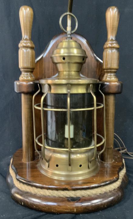 Nautical Maritime Themed Wood Rope Brass Lamp: Vintage light fixture of polished wood with insets of brass glass lantern ship light, rope, and spikes of ship wheel, unusual folk art lamp, lighting, nautical theme, measures to finial height 34 inch