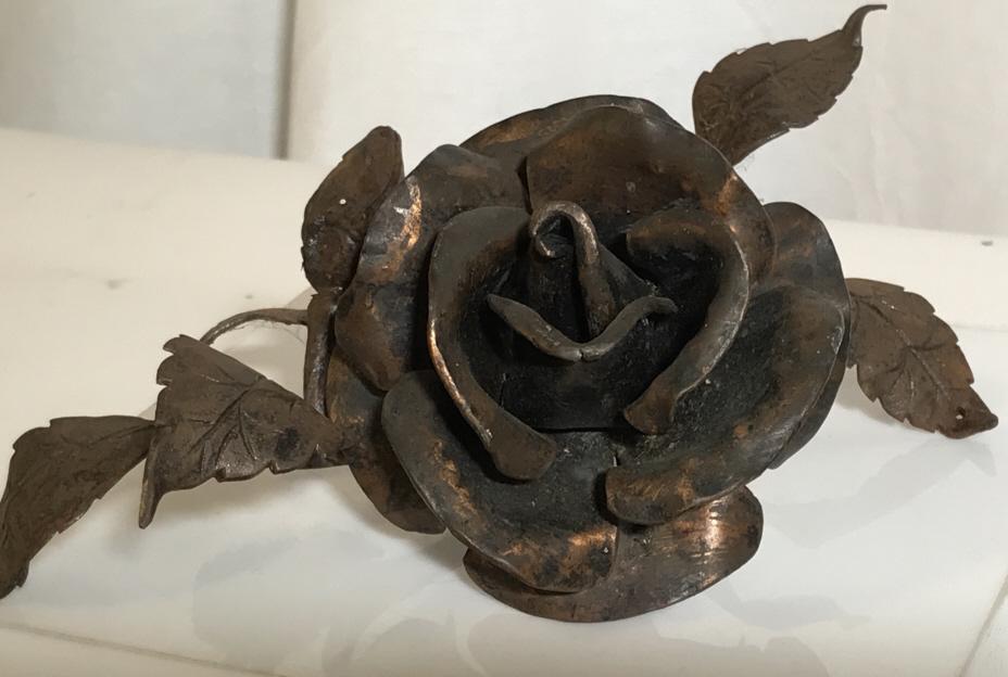 Full Bloom Rose Sculpture, Shelf or Wall: Cheerful full bloom rose metal sculpture, arts and crafts, possibly copper or iron,no evident wear or cracking, discoloration which can be polished away, hints of copper color underneath ,measures 10 