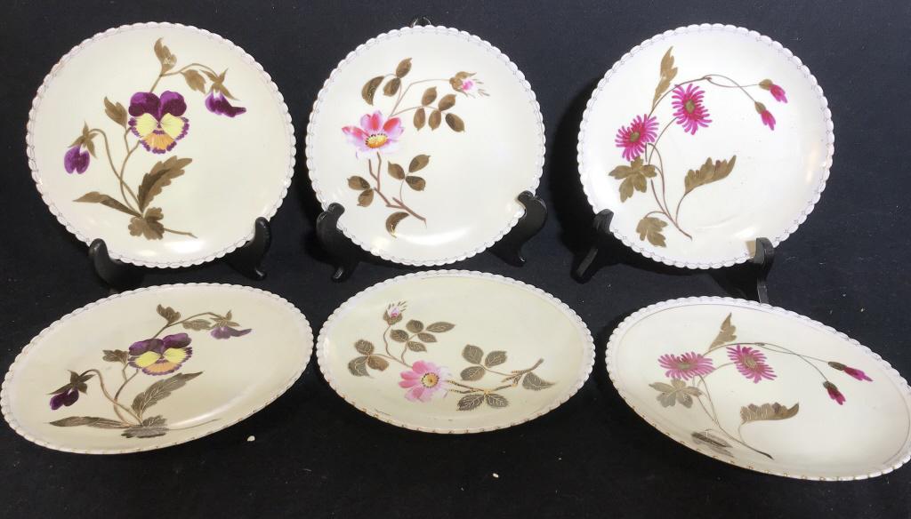Prussian Gilt Hand Painted Floral Porcelain Plates: Antique Set 6 plates, with scalloped edges and hand painted floral designs. No paint fade, vibrant colors. Three different flowers per plate and one set each. Couple of plates have cracks or have been