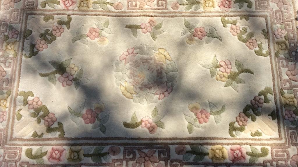 INTERNATIONAL CLASSICS Chang Collection Rugs: Tags on underside read INTERNATIONAL CLASSICS Chang Collection Hand hooked in Korea. Contains multi toned floral detail, including tones of olive, pink, yellow, and cream. measures approx 40 inches wi