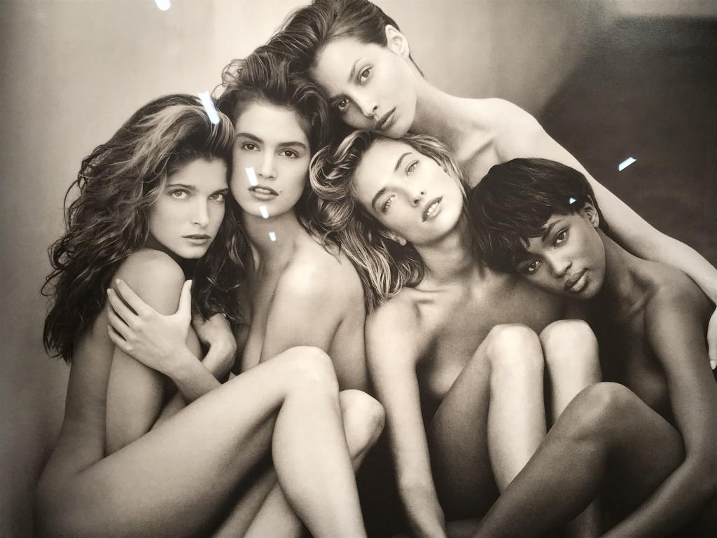 Framed Herb Ritts Exhibition Poster, Supermodels: Framed exhibition poster for Herb Ritts, featuring image of Ritt’s iconic Rolling Stones cover image of Cindy Crawford, Christy Turlington, Naomi Campbell, Stephanie Seymour, and Tatjana Patitz. Typ
