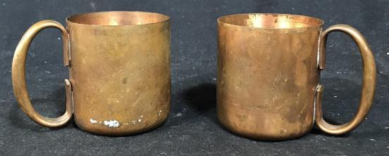 Pair of copper Toned Metal Mugs: Possibly copper set of 2 mugs. Each mug measures approximately 3.5 inches in height. Set of mugs, vintage mugs. tableware, drinking mugs, vessels, 5