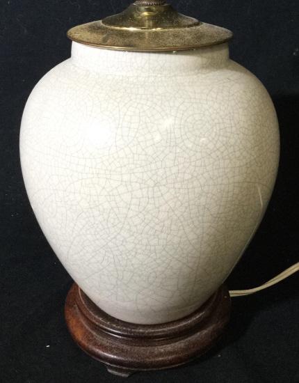 Slate Toned Porcelain Lamp: Lamp is porcelain. Piece is slate toned. Piece contains crazing & wooden base. Measures approx 13 inches tall 7 inches wide. home lighting, home accent and decor, decorative arts and accesories 6