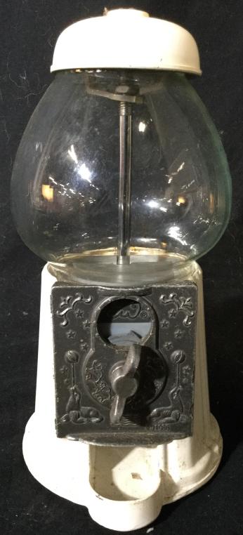 Vintage Gumball Machine Candy Dispenser: Piece is vintage. Machine is glass & Metal with tones of white & silver. Gum ball machine, gum ball dispenser, candy dispenser. vintage collectible Piece measures approx 9.5 inches tall 4.5 inches wid