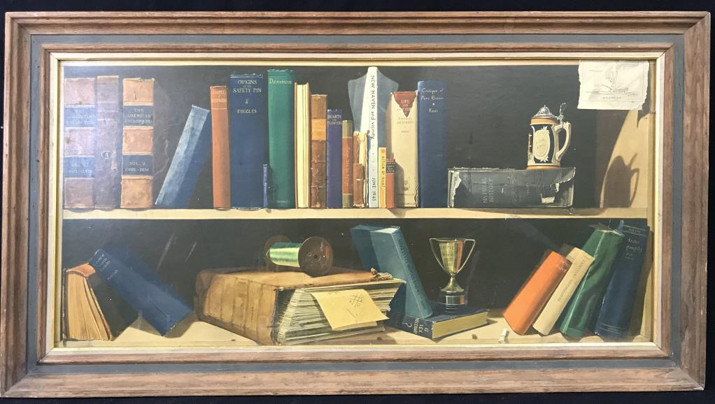 Framed Print On Board Depicting Bookshelf: Print depict a bookshelf with books, a trophy, a beer stein, and a reel of string. Piece is professionally framed with 2 tone wooden frame. Piece measures approx 44 inches long 24 inches tall. Lower r