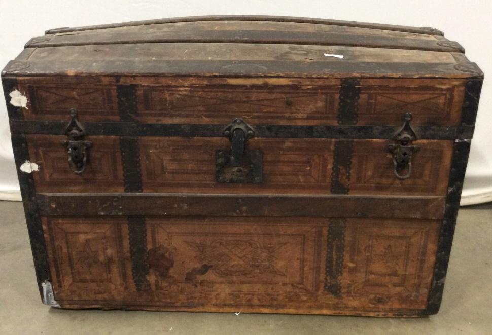 Antique Wooden & Metal Chest: Chest is vintage possibly antique. Piece is wooden and metal. Piece measures approx 30 inches long 21 inches tall 17 inches deep. Chest, trunk, antique trunk, antique chest, toy chest, storage chest. 