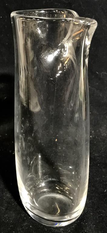 Signed Orrefors Dimpled Crystal Glass Pitcher: Marked on underside for Orrefors. Crystal Glass pitcher, carafe has pinched and pierced detail for spout. Measures approx 9 inches in height by 3.5 inches in width including spout. Orrefors Glass, Swe