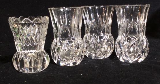 Lot 4 Glass Vases: 3 vases are approximately 3 inches tall. 1 vase is approximately 2.5 inches tall. Vases are cut glass. Tableware, tabletop accessories Glass, vase, vessel, glass vase, glass vessel, cut glass, toothpi