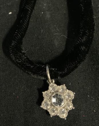 Vintage Rhinestone Velvet Necklace: Rhinestone star pendant, signed illegibly on back, on velvet necklace with silver toned chain and clasp, measures clasp to pendant app 9 inches ladies vintage costume jewelry