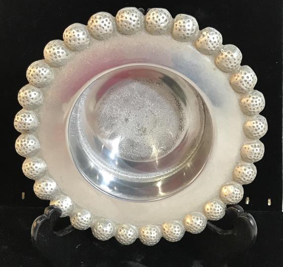 MARIPOSA Hammered Aluminum Wine Coaster, Mexico: Hand Crafted Bowl with decorative orb trim design with textured design, decor. Originally appears to be a wine bottle holder with cork pad. 7 in. Wide, 1 3/4 in deep, opening 4 in. diameter. MARIPOSA