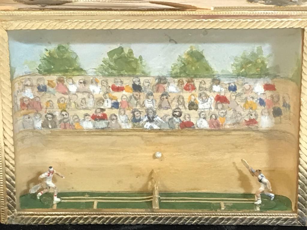 Handcrafted Vintage Shadow Box w Tennis Display: Box is hand decorated with whitewash , gold ribbon and vintage paper. circa 1977. Lid is a shadow box with scene of tennis player figurines playing tennis with pencil and paint background of crown. Un