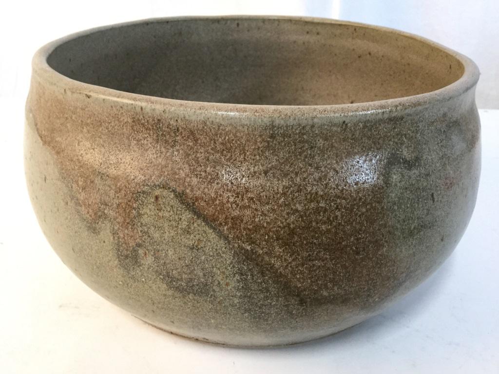 Signed MARC METENER Ceramic Bowl: Underside of bowl is marked MARC METENER. Piece is slate toned. Ceramic bowl, bowl, pottery, pottery bowl, tableware, decorative tabletop accessory, bowl, signed pottery. Piece measures approx 11 inch