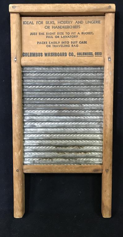Vintage Collectible Tin & Wood Washboard: Vintage light weight wash board. Advertisement reads ‘ DUBL HANDI, Columbus Washboard Co., Columbus, Ohio’ Travel Size washboard for hosiery, lingerie or handkerchiefs. Messures 18 in. long, 8.5 i