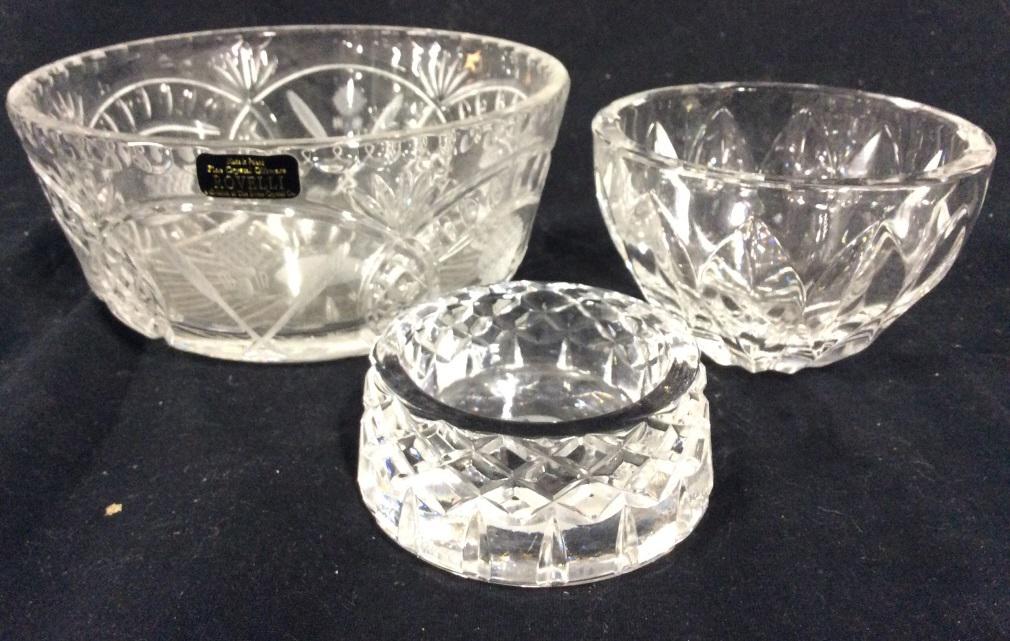 Lot 3 Cut Crystal Bowls: Lot includes 3 Cut Crystal Bowls. 1 is marked ROVELLI, 1 Is marked KOSTA & 1 has logo which resembles Texaco. Piece measures approx 7 inches wide 3 inches tall. tableware, cut crystal, designer collec