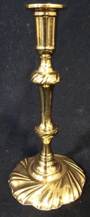 Gold Toned Brass Candlestick: Candlestick is gold toned. Piece appears to be brass. Piece measures approx 9.5 inches tall 4.5 inches wide. decorative accessory, tableware, tabletop accessory 6