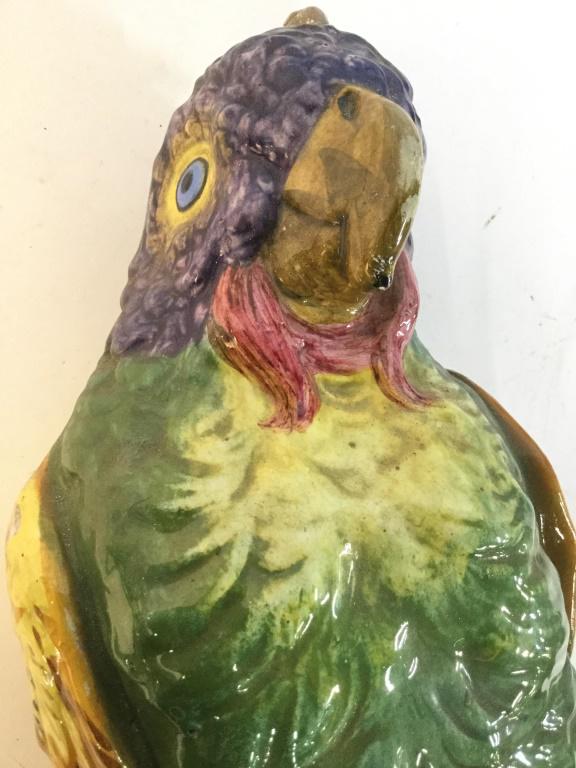 Hanging Painted Porcelain Parrot: Parrot Sculpture appears to possibly be hand painted. piece measures approx 23 inches tall 11 inches wide while hanging. hanging porcelain sculpture, animal statuary entryway decor, whimsical collecti